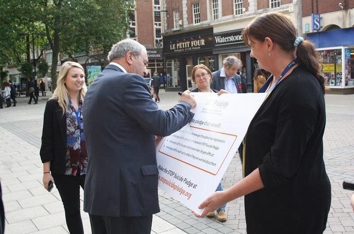 Signing the pledge, Left to Right: Annie Jarvis, Peterborough and Fenland Mind; Marco Cereste, Peterborough City Council and Jo McHattie, Peterborough and Fenland Mind.